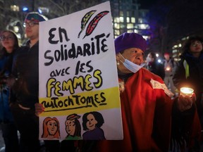 People take part in a march in memory of missing and murdered Indigenous women in Montreal Tuesday, February 14, 2023.. It was organized by the Native Women's Shelter.