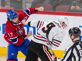 Montreal Canadiens right wing Josh Anderson (17) and Chicago Blackhawks defenceman Connor Murphy (5) duke it out during 1st period NHL action at the Bell Centre in Montreal on Tuesday Feb. 14, 2023.