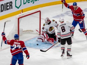 Montreal Canadiens defenceman Justin Barron (unseen) scores against Chicago Blackhawks goaltender Jaxson Stauber (30) during 1st period NHL action at the Bell Centre in Montreal on Tuesday Feb. 14, 2023.
