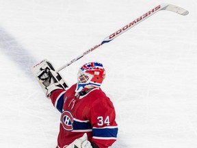 Montreal Canadiens goaltender Jake Allen (34) acknowledges the crowd after a 4-0 win over the Chicago Blackhawks at the Bell Centre in Montreal on Tuesday Feb. 14, 2023.