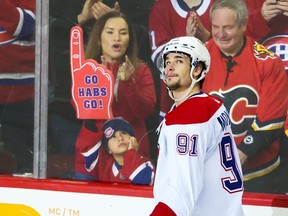 Canadiens forward Sean Monahan watches a tribute video on Dec. 1, 2022, during his first return to Calgary's Scotiabank Saddledome since being traded to Montreal.