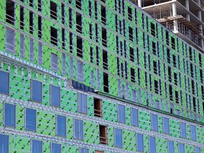 A condo project is seen under construction in Montreal on Monday, August 16, 2021. "The direct effect of (the city's) policies is both to limit the supply of housing and to increase their construction costs, two facts that are directly opposed to housing affordability," Célia Pinto Moreira writes.