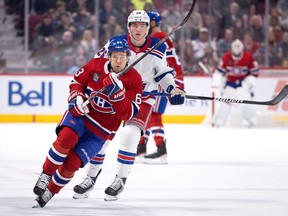 Montreal Canadiens right-winger Evgenii Dadonov breaks away from New York Rangers left-wing Jimmy Vesey in Montreal on Jan. 5, 2023.