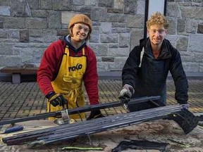 Liam Crosthwaite (left) and Devyn Vincelli work on pieces for a concrete toboggan ahead of the Great Northern Concrete Toboggan Race, which took place in Kelowna in January.