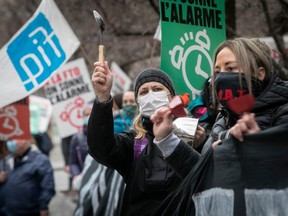 Public-sector workers held a day of protest outside Premier François Legault's office on Wednesday, March 31, 2021.