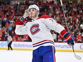 Montreal Canadiens' Kirby Dach reacts to boos from the crowd after scoring the winning shootout goal against the Blackhawks  in Chicago on Nov. 25, 2022.