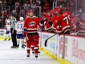 Jesperi Kotkaniemi #82 of the Carolina Hurricanes celebrates after scoring a goal during the first period of the game against the Montreal Canadiens at PNC Arena on Feb. 16, 2023 in Raleigh, North Carolina.