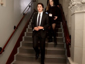Prime Minister Justin Trudeau walks to a caucus meeting on Parliament Hill in Ottawa, Ontario, Canada, Jan. 27, 2023.