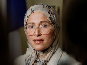 Canada's new anti-Islamophobia representative Amira Elghawaby speaks to media on Parliament Hill in Ottawa, Ontario, Canada February 1, 2023. REUTERS/Blair Gable