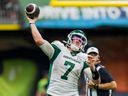 Saskatchewan Roughriders quarterback Cody Fajardo throws a pass against the BC Lions during the second half at BC Place in Vancouver on August 26, 2022.