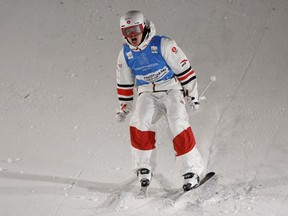 Mikaël Kingsbury of Quebec celebrates his win in the men's dual moguls World Cup competition on Feb. 4, 2023, in Park City, Utah.