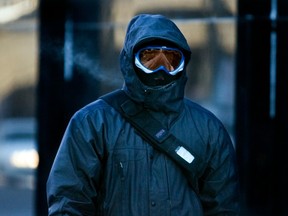 Jim Smith walks on Stanley St. during an extreme cold snap in Montreal on Jan. 14, 2009.