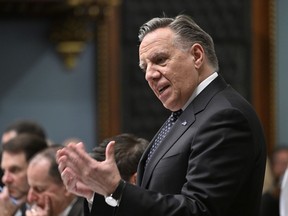 Quebec Premier François Legault responds to the Opposition during question period at the legislature, in Quebec City, Tuesday, Feb. 21, 2023. Legault will travel to Newfoundland and Labrador on Thursday and Friday to participate in the renegotiation of the Churchill Falls hydroelectricity deal.