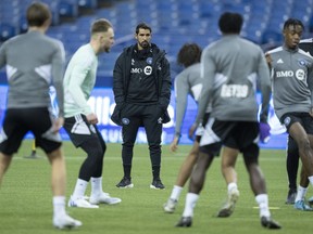 CF Montreal head coach Hernan Losada looks over a practice during the first day of training camp in Montreal on Monday, January 9, 2023. CF Montreal is still in the experimentation phase of camp as it continues pre-season preparations in Florida.THE CANADIAN PRESS/Paul Chiasson