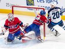 Canadiens' Jordan Harris slams into the post during a game in January. “I was surprised how often you get hit in the face,