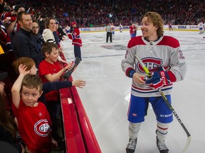 Canadiens forward Rem Pitlick interacts with young fans during a team skills competition at the Bell Centre in February.