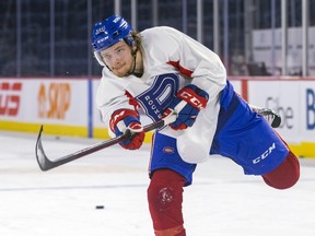 Nate Schnarr follows through on a shot during Laval Rocket practice at the Place Bell Sports Complex in Laval on Feb. 28, 2023.