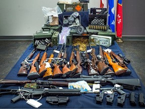 Some of the 37 firearms seized by the RCMP from a house on Aquin St. in Vaudreuil-Dorion on Nov. 30.
