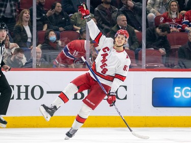 Carolina Hurricanes' Jesperi Kotkaniemi celebrates after scoring the game-winning goal in a shootout against the Montreal Canadiens during a National Hockey League game in Montreal Tuesday March 7, 2023.