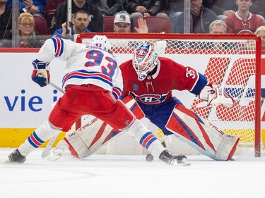 New York Rangers' Mika Zibanejad beats Montreal Canadiens' Sam Montembault for the winning goal during the shootout of a National Hockey League game in Montreal Thursday March 9, 2023.