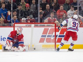 New York Rangers' Mika Zibanejad beats Montreal Canadiens' Sam Montembault for the winning goal during the shootout of a National Hockey League game in Montreal Thursday March 9, 2023.