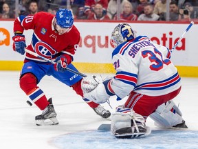 Canadiens' Anthony Richard can't control the puck in front of New York Rangers goaltender Igor Shesterkin during the third period of a National Hockey League game in Montreal Thursday March 9, 2023.
