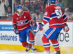 Montreal Canadiens winger Josh Anderson celebrates with David Savard after scoring short-handed goal during second period against the New York Rangers in Montreal on March 9, 2023.