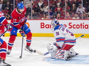 Canadiens' Josh Anderson looks for the rebound as New York Rangers' Igor Shesterkin makes a save during the first period of a National Hockey League game in Montreal Thursday March 9, 2023.