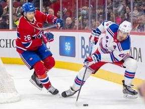 Canadiens' Jonathan Kovacevic pursues New York Rangers' Chris Kreider during the second period of a National Hockey League game in Montreal Thursday March 9, 2023.