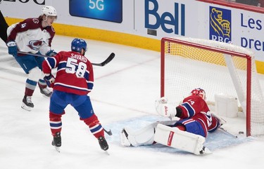 Montreal Canadiens goaltender Jake Allen (34) is scored against by the Colorado Avalanche during first-period NHL action at the Bell Centre in Montreal on Monday March 13, 2023.