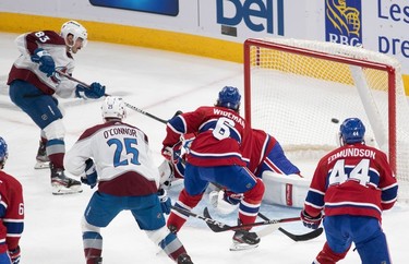 Colorado Avalanche left wing Matt Nieto (83) scores against Montreal Canadiens goaltender Jake Allen (34) during first-period NHL action at the Bell Centre in Montreal on Monday March 13, 2023.