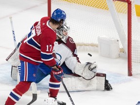 Montreal Canadiens right wing Josh Anderson (17) watches the puck get past Colorado Avalanche goaltender Alexandar Georgiev (40) on a shot from Montreal Canadiens right wing Denis Gurianov during second-period NHL action at the Bell Centre in Montreal on Monday March 13, 2023.