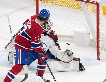 Montreal Canadiens right wing Josh Anderson (17) watches the puck get past Colorado Avalanche goaltender Alexandar Georgiev (40) on a shot from Montreal Canadiens right wing Denis Gurianov (25) during second-period NHL action at the Bell Centre in Montreal on Monday March 13, 2023.