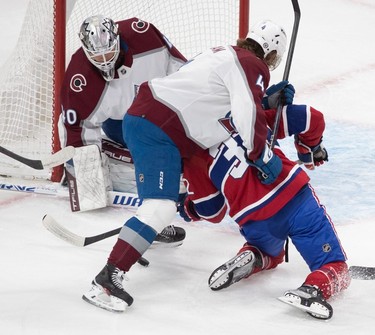 Montreal Canadiens centre Rem Pitlick (32) can't get to the puck in front of Colorado Avalanche goaltender Alexandar Georgiev (40) during first-period NHL action at the Bell Centre in Montreal on Monday March 13, 2023.