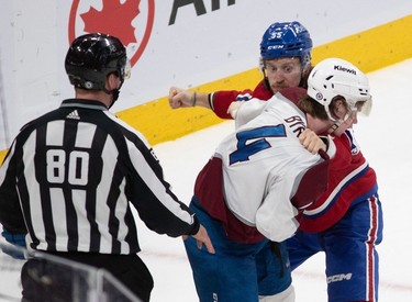 Montreal Canadiens left wing Michael Pezzetta (55) and Colorado Avalanche defenceman Bowen Byram (4) drop the gloves during third-period NHL action at the Bell Centre in Montreal on Monday March 13, 2023.