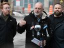 Ensemble Montréal Leader Aref Salem, centre, Julien Hénault-Ratelle, left, and Benoit Langevin speak to reporters about the Gay Village and the four-point plan they have to restore it during a press conference on Thursday, March 16, 2023.