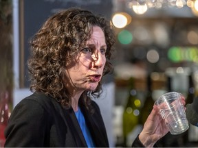 Marie-Andrée Mauger, Montreal's executive committee member in charge of ecological transition, is seen at at press conference with banned cup. The city's new single-use plastics bylaw goes into effect on Tuesday, March 28, 2023.