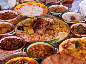 At the traditional Saudi restaurant Najd Village in Riyadh, diners sit on fancy carpets and feast on dishes like lamb soup, spicy pepper salad and camel stew.
