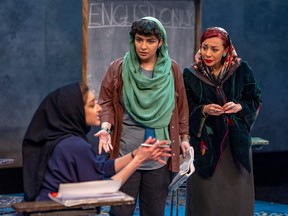 Ghazal Azarbad, as Elham, and Banafsheh Taherian, as Roya, right, listen to Ghazal Partou, as Marjan, during Segal Centre production of English in Montreal on Wednesday, March 29, 2023.