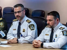 Inspector Kimon Christopoulos of the Laval Major Crimes Division, left, Dominique Côté of the Montreal police's organized crime division detailed an investigation at Laval police headquarters on Thursday, March 30.
