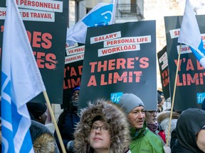 Members of the Fédération interprofessionelle de la santé du Québec (representing nurses, respiratory therapists, and others) demonstrate outside a hotel in Montreal Thursday March 30, 2023.