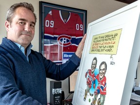 Canadiens owner/president Geoff Molson poses with a framed cartoon by the Montreal Gazette’s Terry Mosher (Aislin) in his office on seventh floor of the Bell Centre.