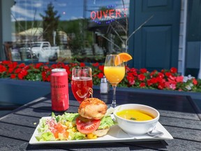 The Auberge La Chocolatière, a bike-friendly inn in North Hatley, has an all-day happy hour and serves delightful meals with chocolate accents.