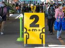 People try to respect social distancing rules at Jean-Talon Market in September 2020. Many people found ways to combat solitude by connecting with others during intense periods of the pandemic — for example, meeting outside at a distance — notes the senior author of a McGill University-led study into the global crisis's impact on mental health.