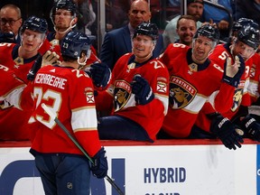 SUNRISE, FL - MARCH 16: Teammates congratulate Carter Verhaeghe #23 of the Florida Panthers after he scored a first period goal against the Montreal Canadiens at the FLA Live Arena on March 16, 2023 in Sunrise, Florida.