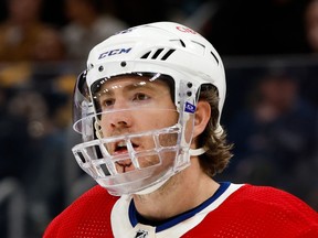 Mike Hoffman #68 of the Montreal Canadiens skates against the Boston Bruins with a newly attached face shield due to a crosscheck to the face earlier in the game at the TD Garden on March 23, 2023 in Boston.