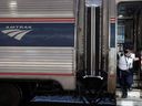 A conductor prepares an Amtrak train to depart Union Station in Washington, D.C. on September 3, 2021.