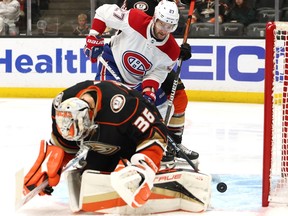 The Canadiens’ Jonathan Drouin pounces on loose puck in crease behind Ducks goalie John Gibson to score his first goal of the season during first period of Friday night’s game at the Honda Center in Anaheim.