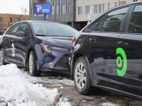 Communauto cars are seen in a parking lot in Montreal on Wednesday, Jan. 25, 2023.