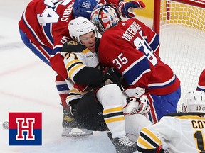 Montreal Canadiens defenceman Jordan Harris squeezes Taylor Hall of the Boston Bruins into  Canadiens goaltender Sam Montembeault on Jan. 24, 2023.